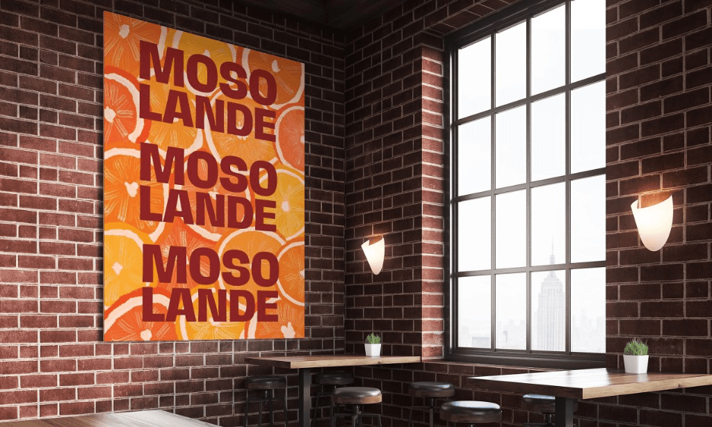 Mosolande brand poster on display inside a warm brick restaurant